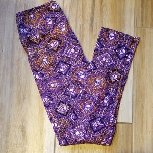 LuLaRoe Unique Purple and Gold Skull Patterned Leggings OS